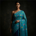 Woman wearing a blue saree with floral patterns on a dark background